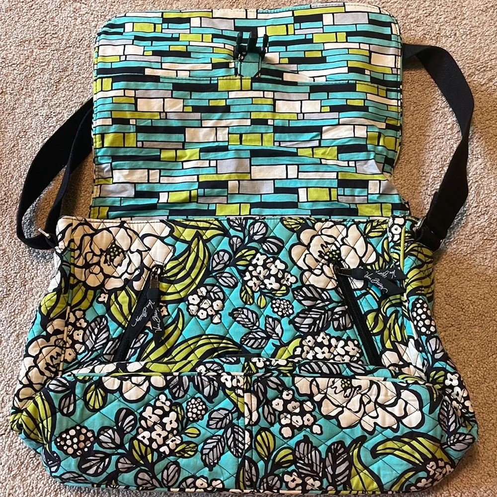 Vera Bradley, blue white, and green laptop case with over the shoulder strap.